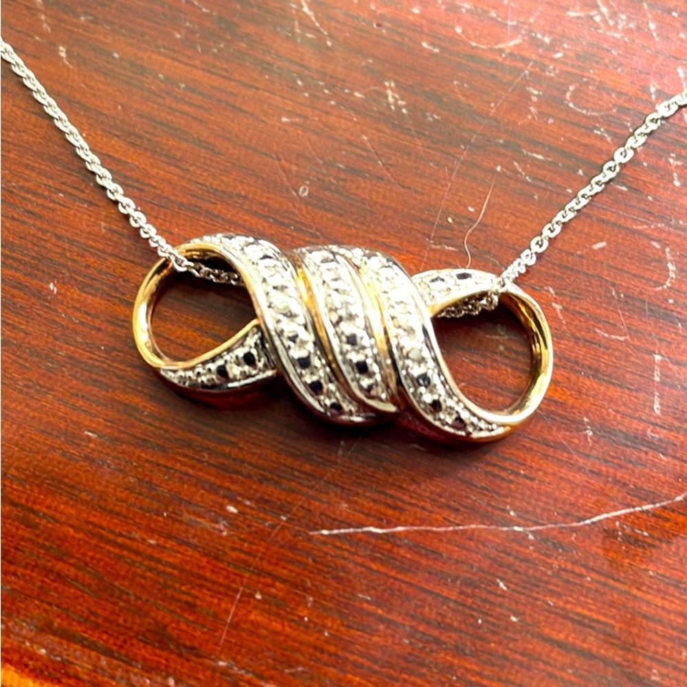 Striking 925 Necklace and pendant with gold tone back. Sterling Silver marked.